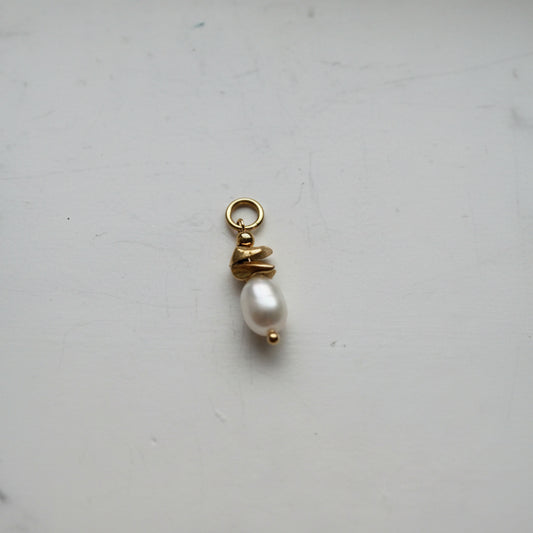 Pearl and gold charm